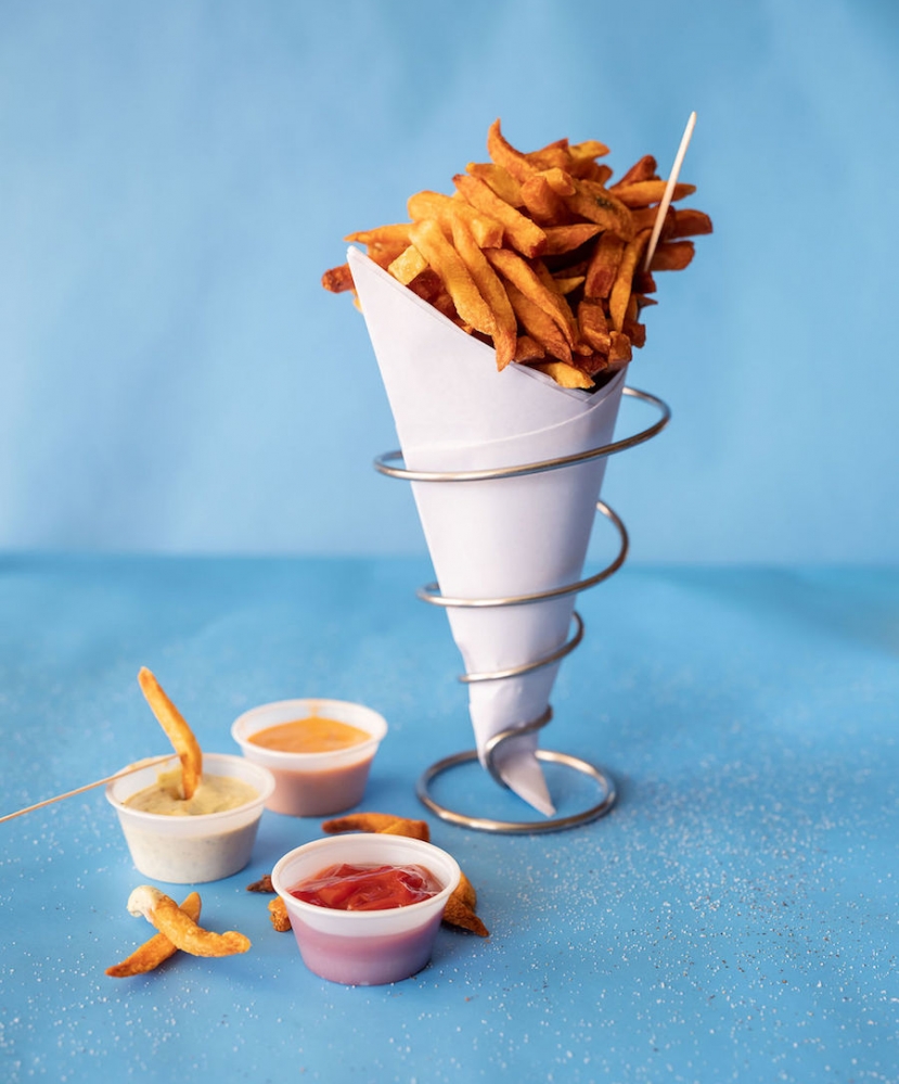 Decadent pommes frites with dipping sauce at Ravenous Crepes in Saratoga Springs, New York.